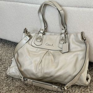 Pearl white Coach handbag with shoulder strap